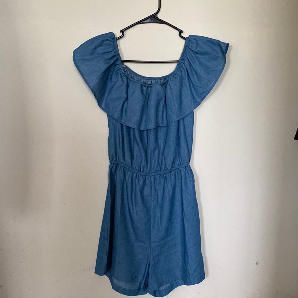 Never worn, adjustable shoulders, size S